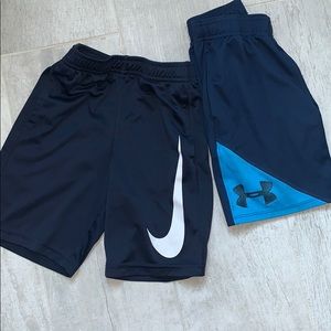 Two pairs of boy shorts- Nike and Under Armor, 7
